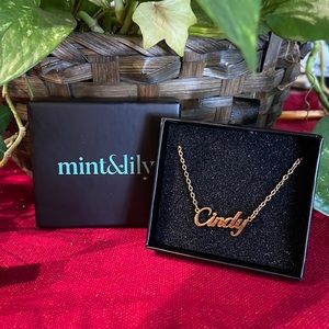 Gold “Cindy” necklace.